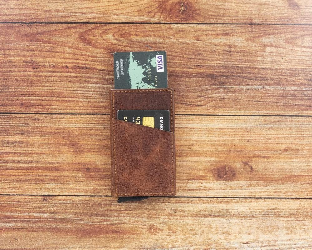 Bayelon Torres Leather Mechanical Card Holder Brown